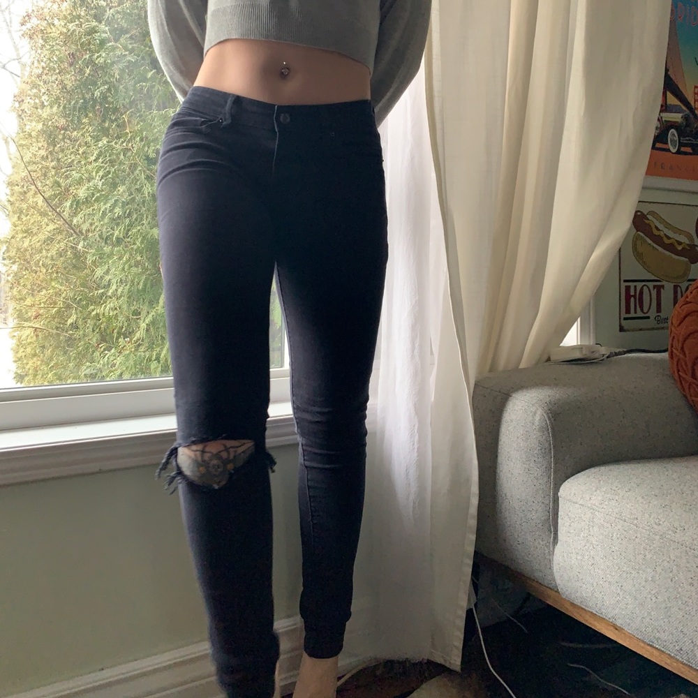 Levi’s 711 Black Ripped Skinny Jeans